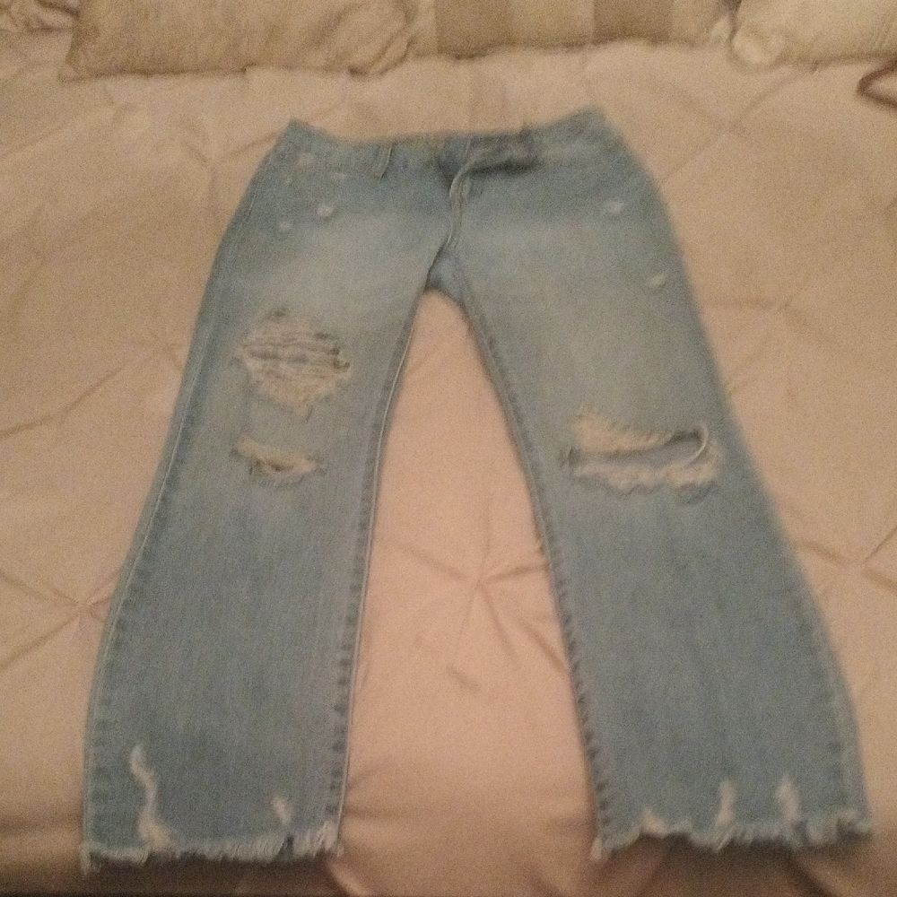 Distressed Light Blue Jeans